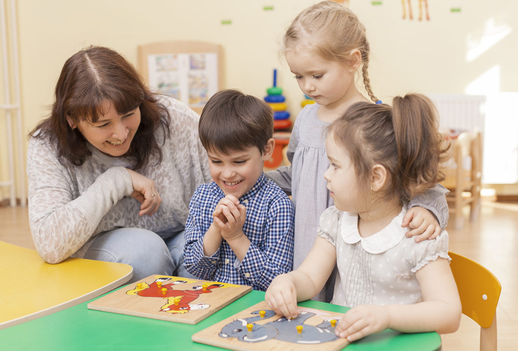 teacher-with-students-1024x694